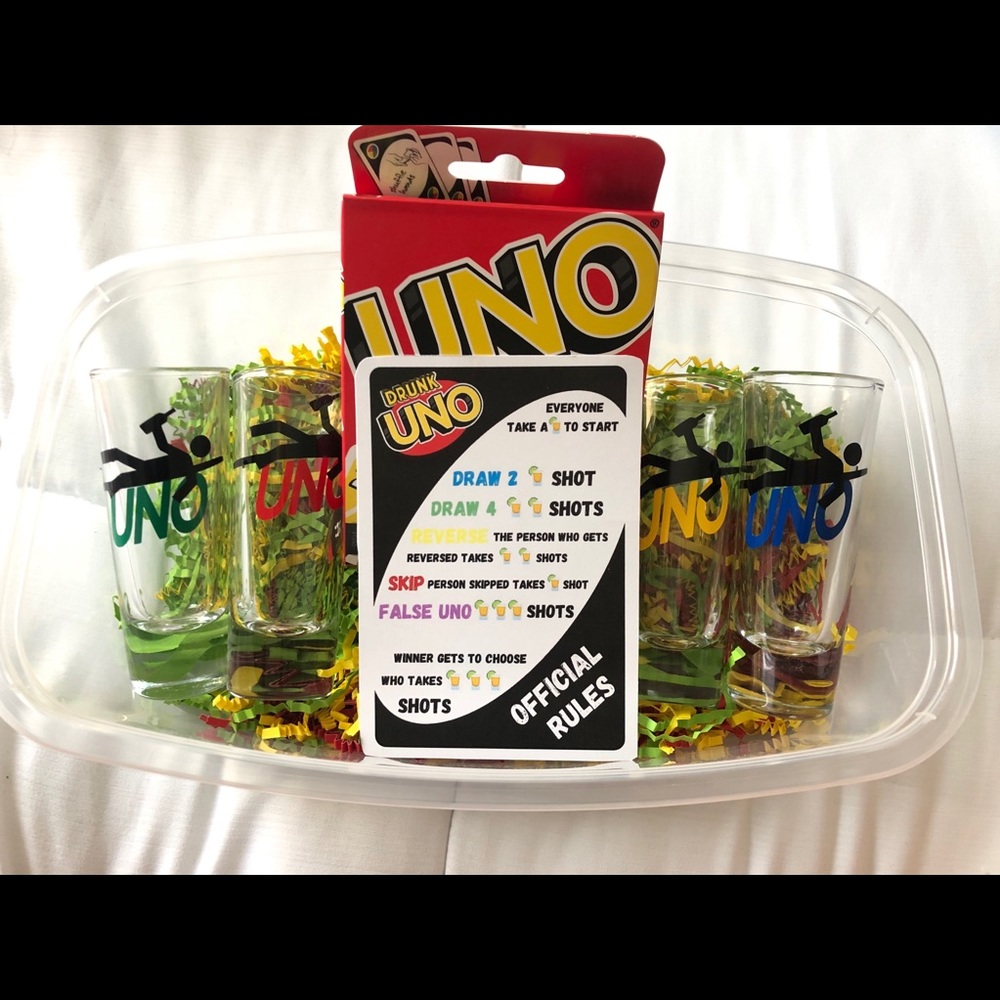 Drunk Uno with 4 shot glasses, rules, and cards